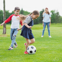 children playing football