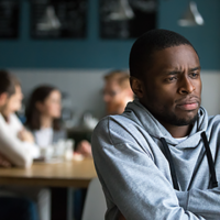 boy sat in classroom