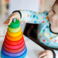 toddler playing with toy