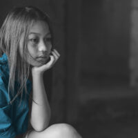 Portrait of a poor little thailand girl lost in deep thoughts, poverty, Poor children, War refugees