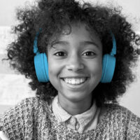 Happy teen with headphones on