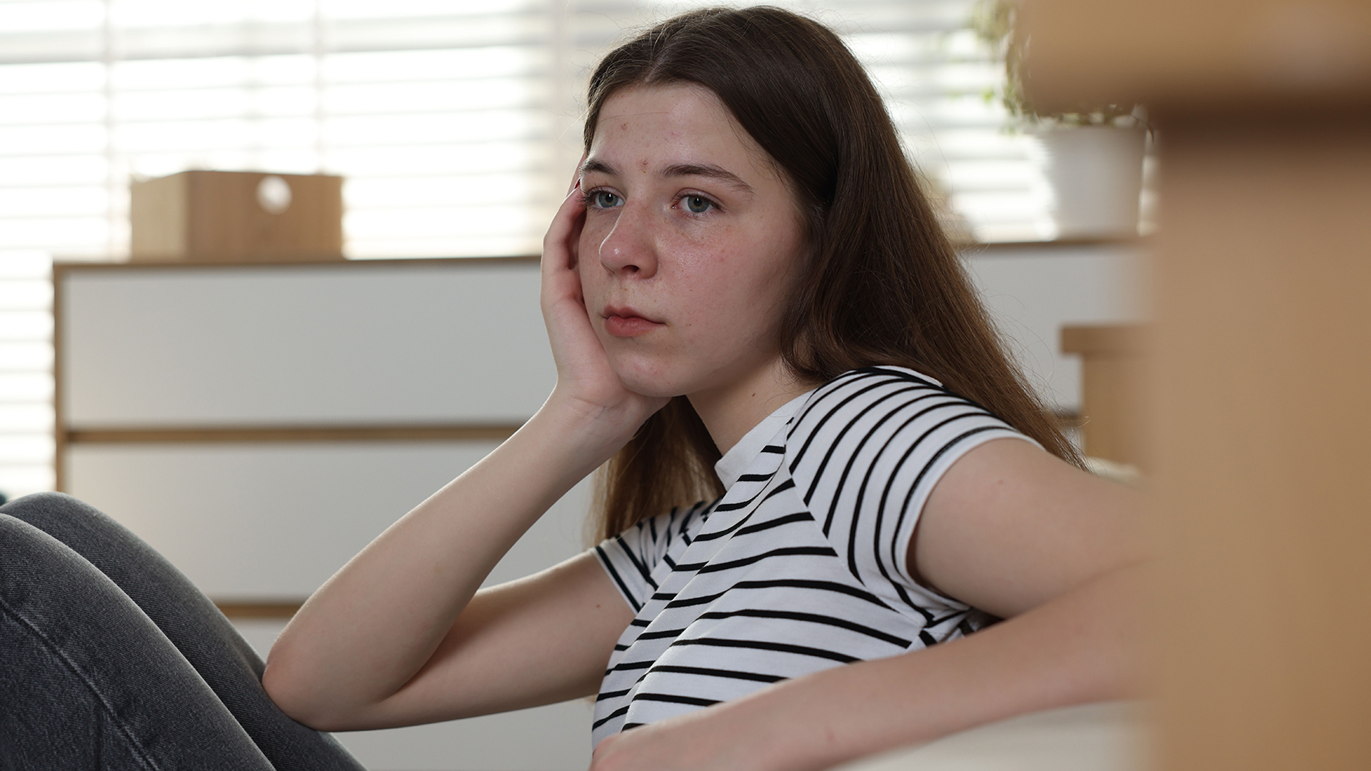 DBTA_adolescent_girl_staring into the distance