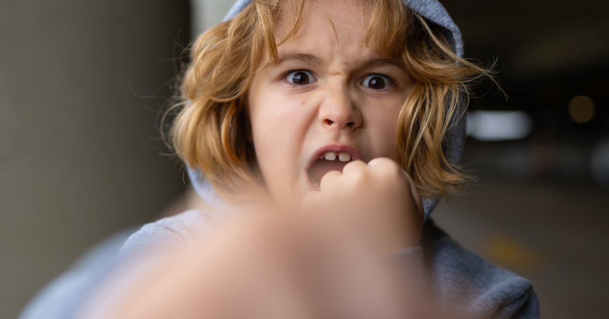 ggression kid boy fighting on street. Angry aggression kid with fist. Aggression fight kid. Bullied, physical abuse, children fighting. Aggression little boy. Kids bad behavioral.