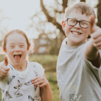 Happy siblings in the garden
