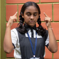 An Indian school girl showing signs of stress