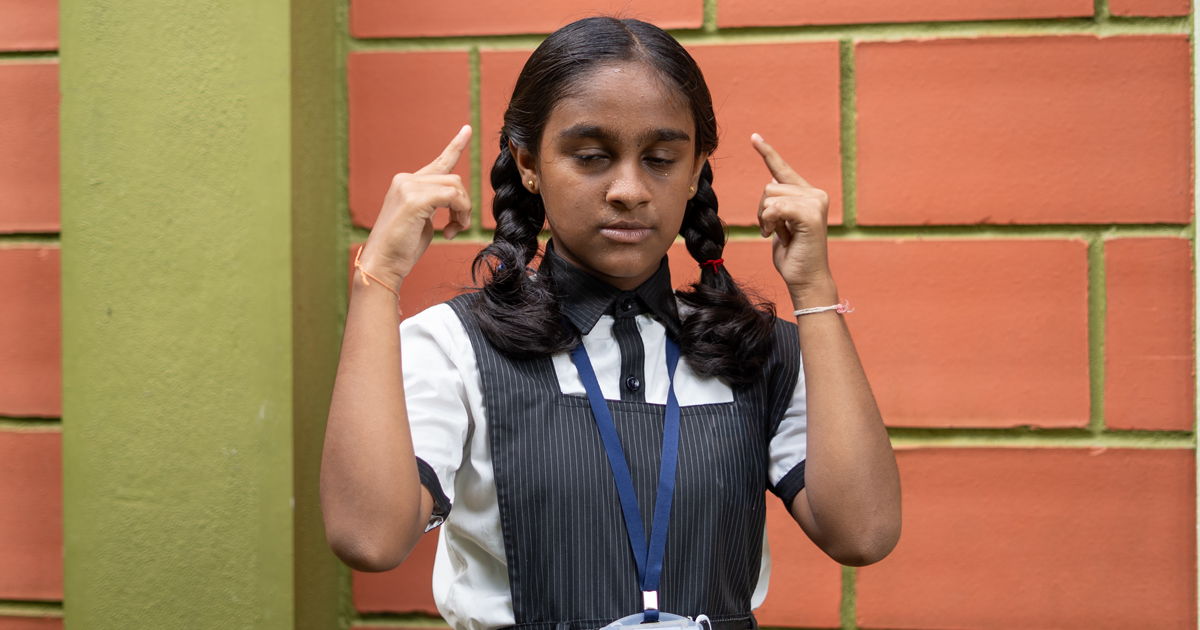 An Indian school girl showing signs of stress