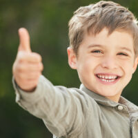 Young,Boy,,Happy,And,Thumbs,Up,Outdoor,For,Fun,,Playing