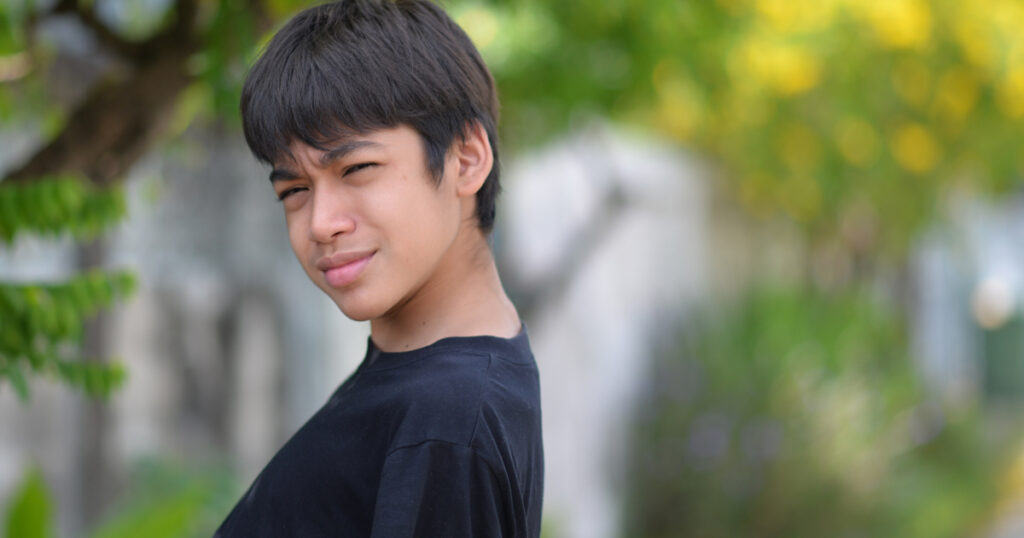 Cute Teenage Boy's portrait happy joy with smile