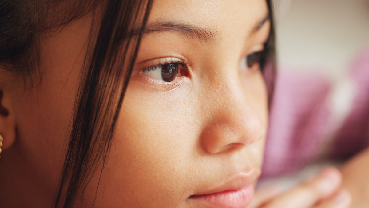 Sad, thinking and girl with depression, kid and abandon with anxiety, mental health and foster care trauma. Home, adoption and child with emotion, ptsd and stress with mistake, reflection and grief