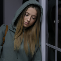 Teenage girl looking sad, representing adolescent mental health training