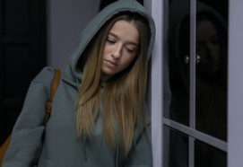 Teenage girl looking sad, representing adolescent mental health training