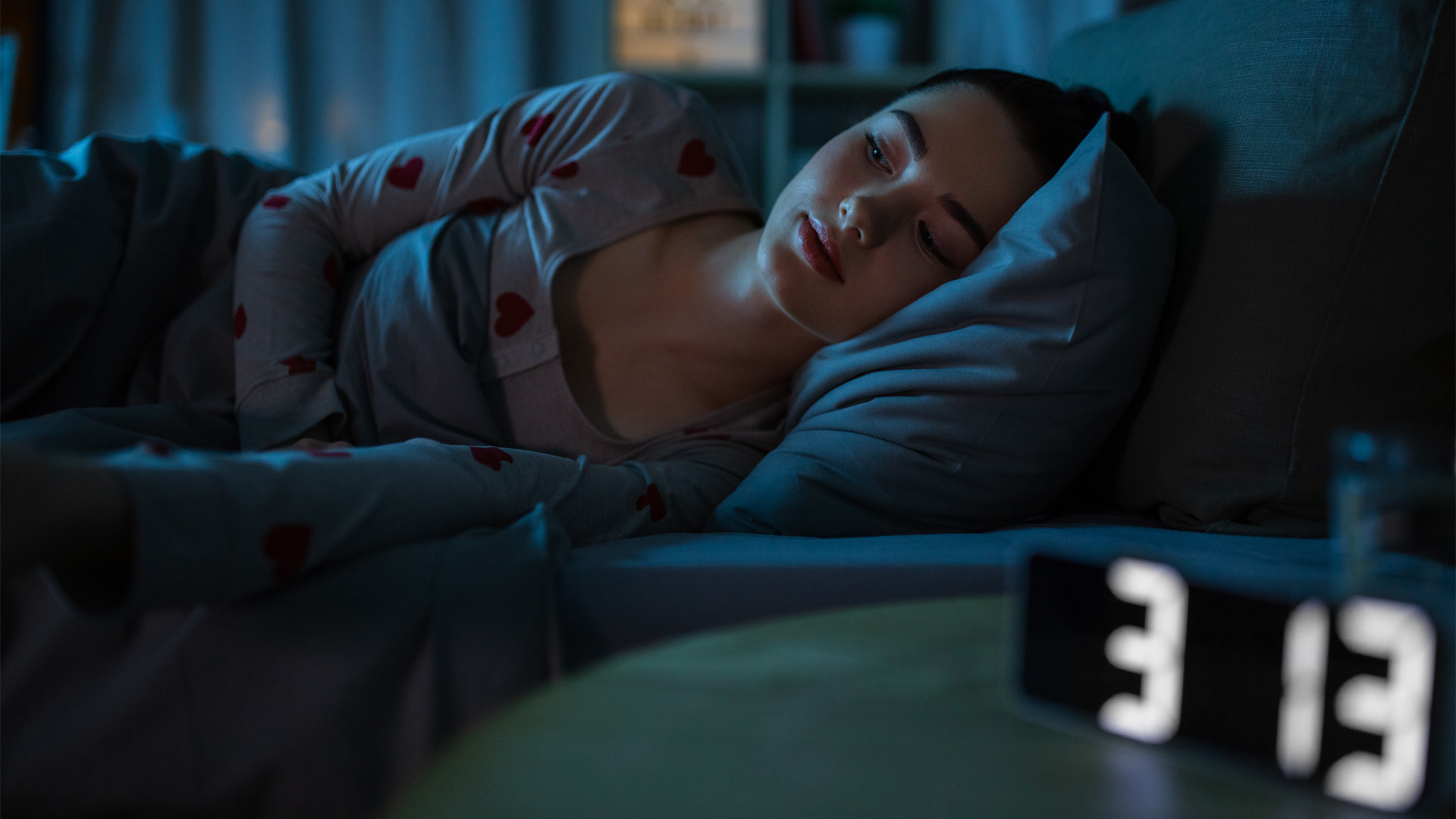 awake teenage girl lying at home at night awake teenage girl lying at home at night